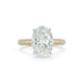 The Emily Engagement Ring with oval cut center diamond with 3-sided micro pave diamonds on yellow gold band